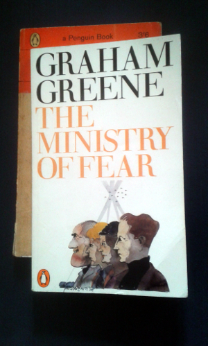 The Ministry of Fear by Graham Greene; Penguin Paperback (1897); 1974 edition; cover by Paul Hogarth