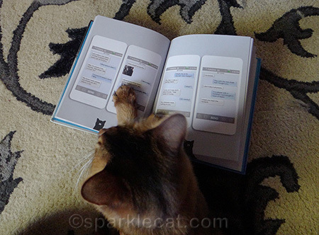 Yes, I use my paw to keep track of where I am on the page