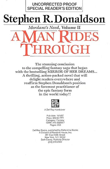  photo A man rides through arc.jpg