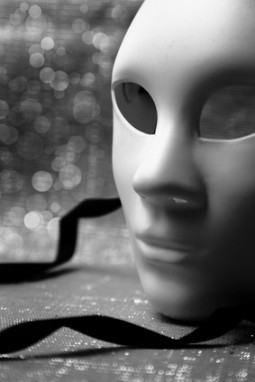 White mask with glittering background