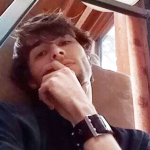 thomas_headshot_light_2x2