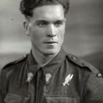 Antoni Paszkiewicz wearing his parachute qualification badge and parachute collar badges