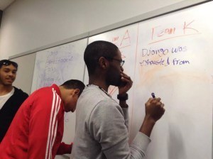 Flowered Concrete's Alton Taylor and Kevin Anglade compete in an artistic face off involving their professions.