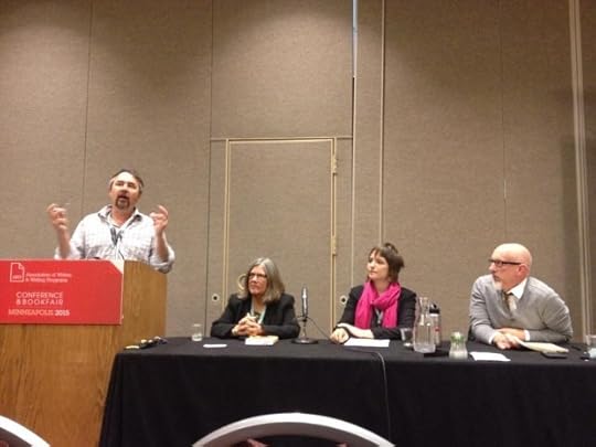 Pontificatin with arms flying. If I had my cartoon stuff I would draw thought bubbles over Alison, Chris and Ana Lena's heads.