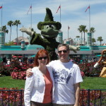 Susan and Andrew with Mickey