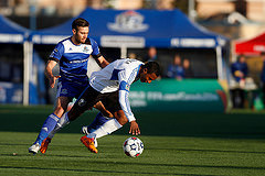 From the 2014 Voyageurs Cup semifinal: FC Edmonton's Ritchie Jones challenges' the Impact's Patrice Bernier. The Impact came within seconds of being eliminated by the Eddies. 