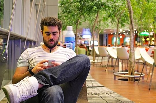 layover-real-travel-airport-man-on-phone