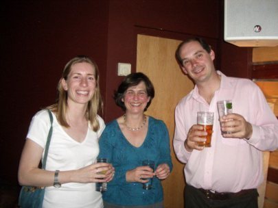 Giles Bell, the apogee of sporting prowess is the one on the right. As you can see, he's very tall which is why he's having to concentrate extremely hard on not smacking his head on the speaker mounted at a height that is well above danger level for most of us. I apologise to the lady in the middle for not knowing who he is. The lady on the left is his wife. ;-)