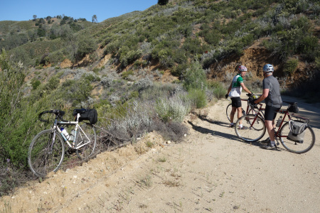 John Woodfill and Ned Black discuss next steps on Milpitas Road before the descent.