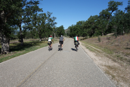 Del Venturi Road climbs gradually through an oak-covered valley.