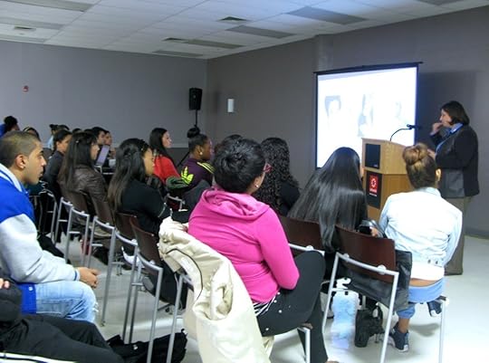 The audience at LaGuardia College listens at the 