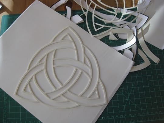 All of the watermarks (seven geometric designs and the title for the cover) were cut by hand.