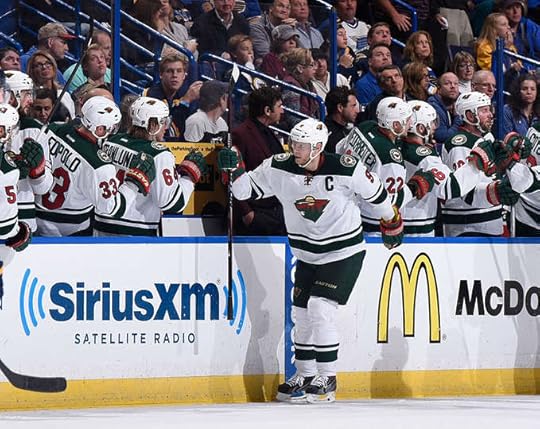 Mikko Koivu celebrates the Wild's first goal.
