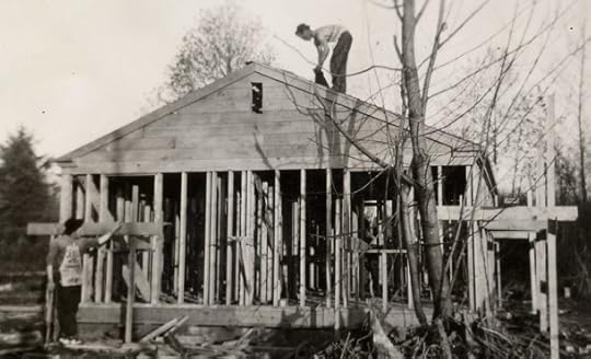 Dad and Jim's first house, Dad on the roof