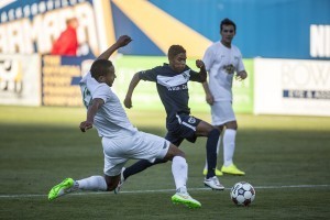 Chaim Roserie is pictured with the ball at his feet