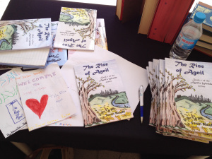 A pile of books to be signed.