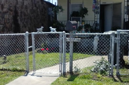 A little spray paint and the metal fence is looking much better!