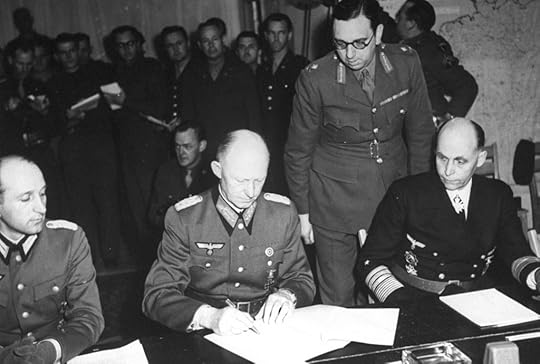 ColGen Alfred Jodl signing the documents of Germany’s surrender, Reims, France, 7 May 1945. (US Army Signal Corps)