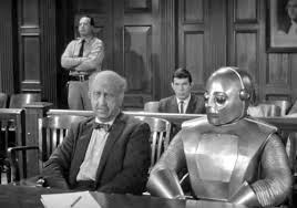 Howard Da Silva in The Outer Limits episode I Robot. Note Leonard Nimoy in the back.