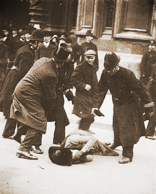 Suffragette beaten by police