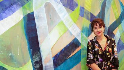 The winner of the Bulgari Art Award, Ildiko Kovacs, with her painting Onda. Photograph by Renee Nowytarger. Image sourced from The Australian.
