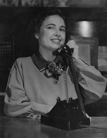 Since Dad worked for the phone company, he was always posing the family with telephones.