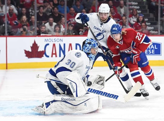 Tampa goalie Ben Bishop stops Dale Weise.