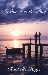 romantic couple on dock with row boat at sunset/sunrise