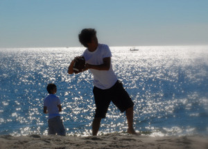 Boy throwing ball by Kasia