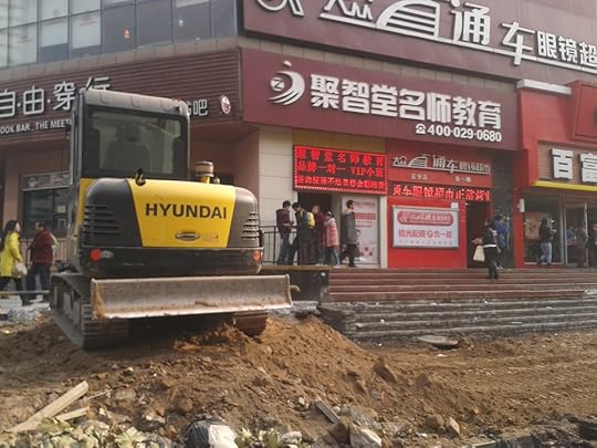 GUAN returns to his newly rented and cramped apartment in the Qinglinyuan gang neighborhood in the northeast corner of Wudaokou. It is a run-down, abandoned industrial area not far from campus. He waits and practices developing his intuition through qi-gong.