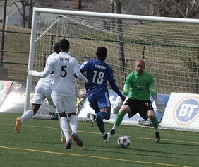 Strikers' goalie David Meves makes one of his many saves, this time robbing FCE's Tomi Ameobi. PHOTO: FC EDMONTON/TONY LEWIS