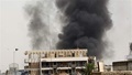 Smoke rises after a car bomb attack in the Karrada neighborhood in Baghdad, Iraq May 9, 2015. 