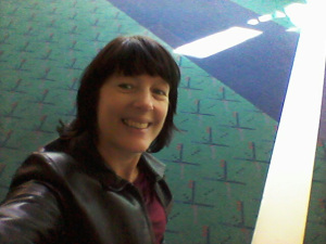 The geek selfie -- me with the about-to-be-replaced carpet at PDX