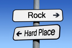 Between a rock and a hard place.