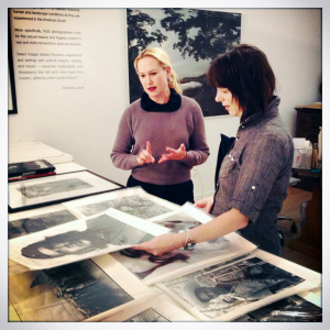Gallerist Rebekah Jacaob, on the left, showing me the work of Cuban masters