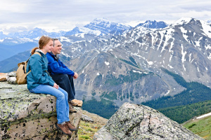 Father and daughter in mountains