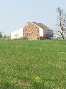 McPherson's Barn. This is the original barn, but the house that was there is now gone. A doctor set up a field hospital here just after the battle on July 1. This is important to jefferson Coates story because he lay blinded in the wooded area about 500 feet from here. If he could have seen, this would have been in his sight.