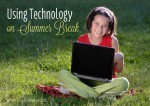 Young girl is sitting in the park with laptop