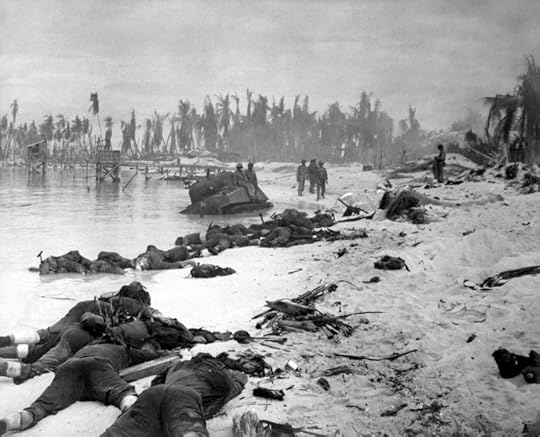 American corpses sprawled on the beach of Tarawa, November 1943. Public domain via Wikimedia Commons.