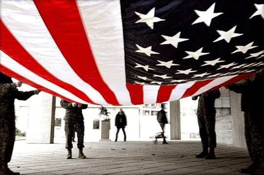 Soldiers preparing to fold an American flag by Vince Alongi. CC BY 2.0.