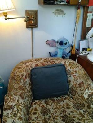 My writing nook: a chair under a lamp