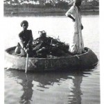 Boatmen on the River Tigris in a 'gufa', a round boat made of wickerwork thickly coated with bitumen