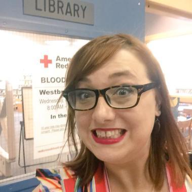 Me outside the library. I spent a lot of time in the library not doing homework and tricking the librarians who didn't know what blogging was into letting me blog because nobody knew what blogging was yet. Sorry not sorry.