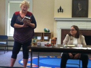 Fellow author Christine Wenger reading a passage from Moonlight Serenade