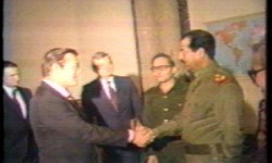 Donald Rumsfeld shakes hands with Saddam Hussein in 1983.