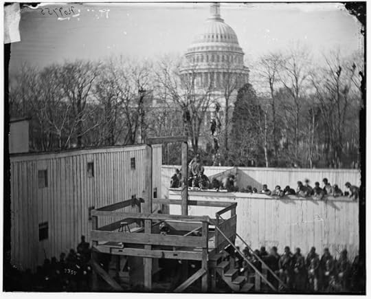 The hooded body of Henry Wirz hanging from the scaffold (Library of Congress)