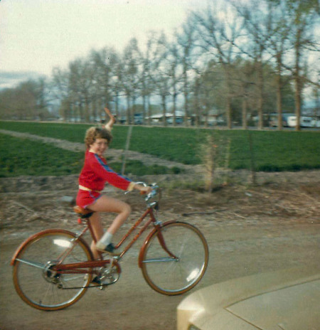 Since I could do the baling, I was most likely doing this -- riding my bike. And, take a good look at my jazzy jacket -- dang, I loved that outfit!