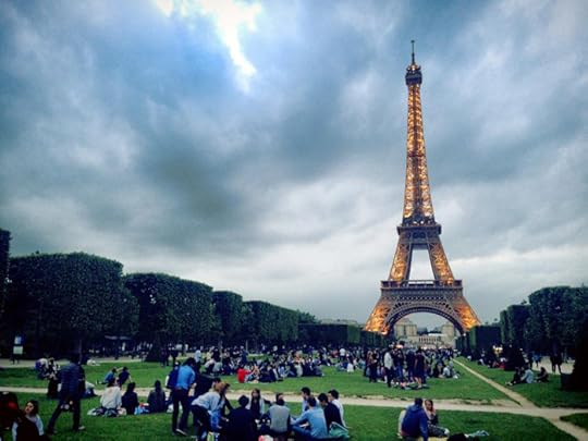 Hanging out with friends in the glow of the Eiffel Tower.