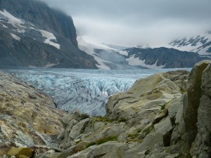 glacier surrounded by mountains