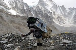 Porters sometimes feel like they are carrying a house on their back, and now they literally can